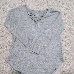 Plush crisscrossed neckline sweater